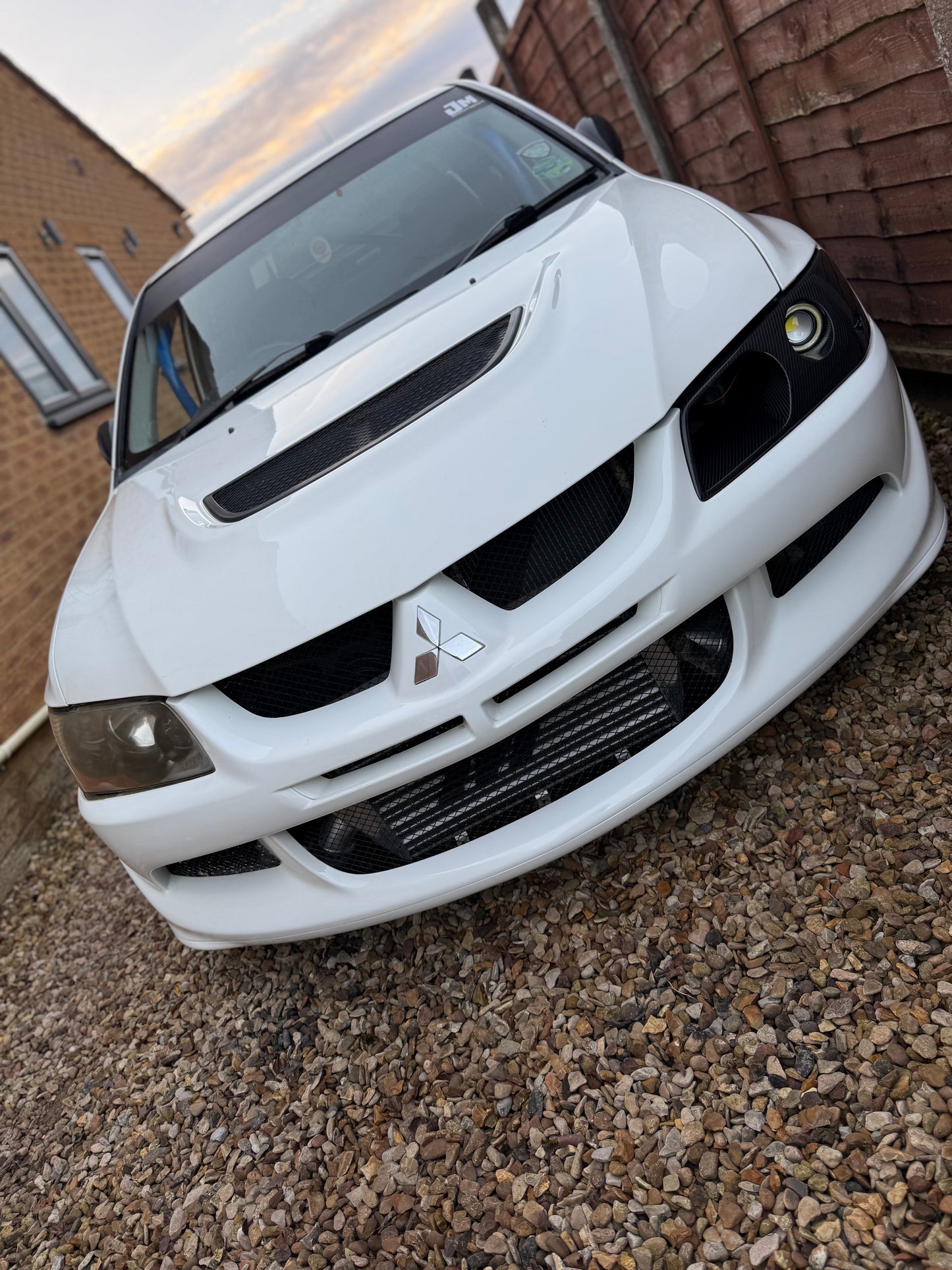 Mitsubishi Evo 7,8,9 Genuine Carbon fibre LED headlight vented air intake