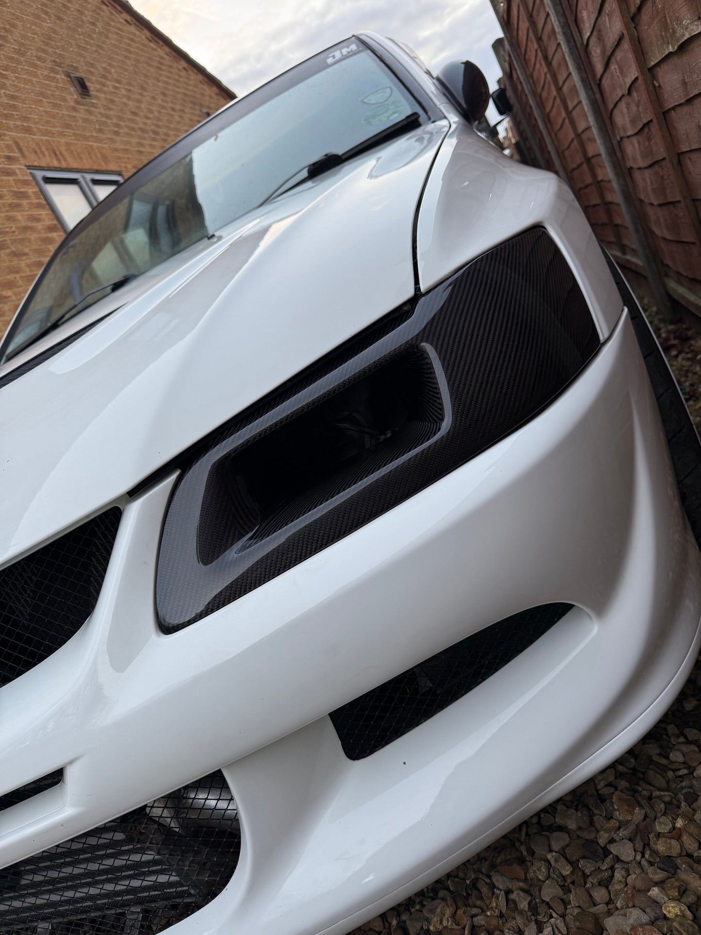 Mitsubishi Evo 7,8,9 genuine carbon fibre vented headlight replacement air intake