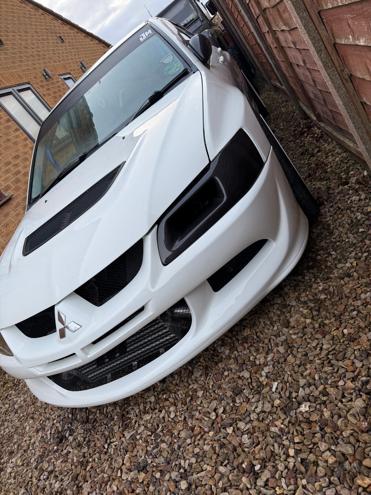 Mitsubishi Evo 7,8,9 genuine carbon fibre vented headlight replacement air intake