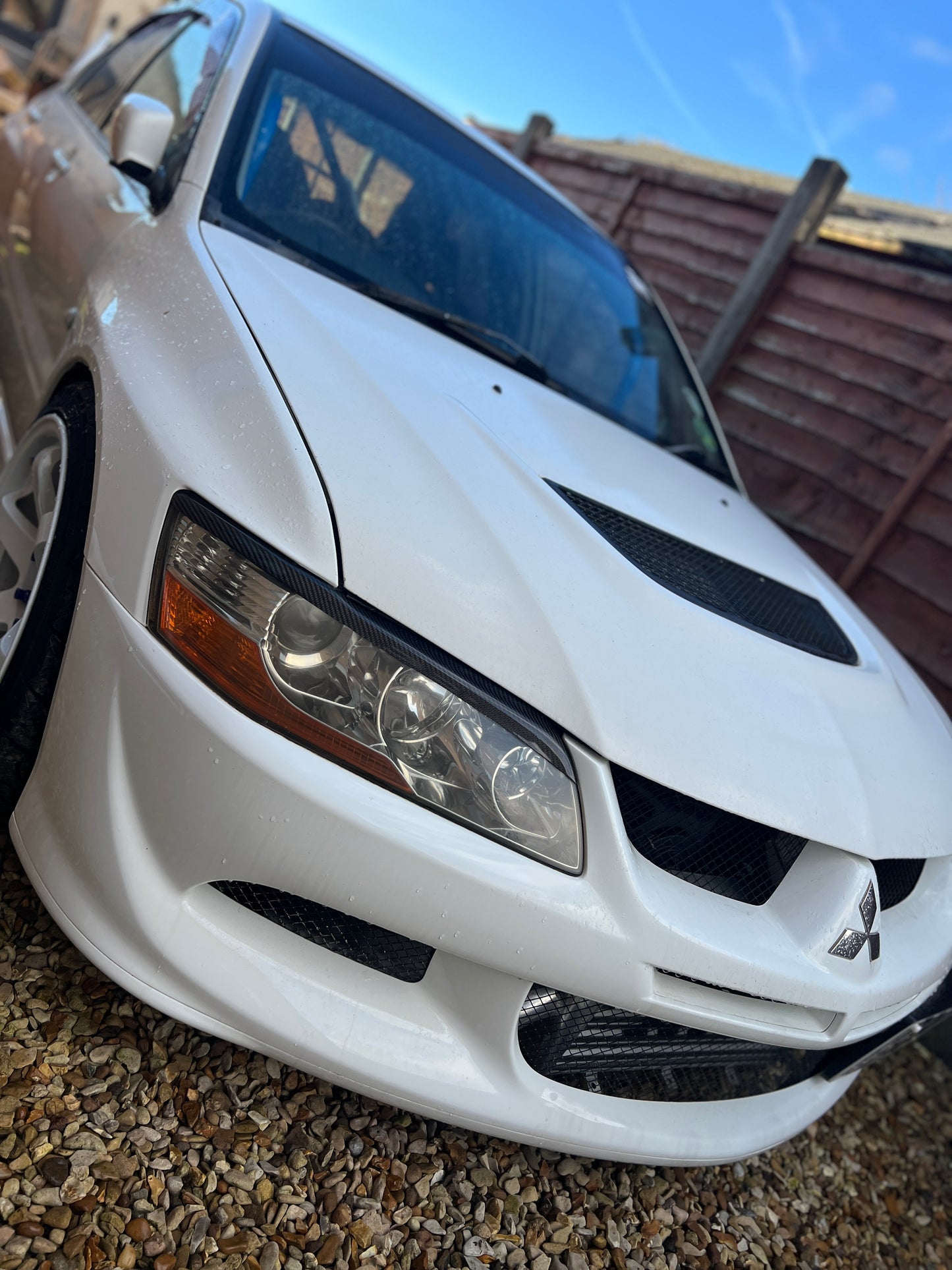 Mitsubishi Evo 7,8,9 genuine carbon fibre headlight eyebrows